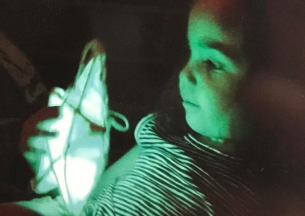 My niece, Scarlett, holding a star.